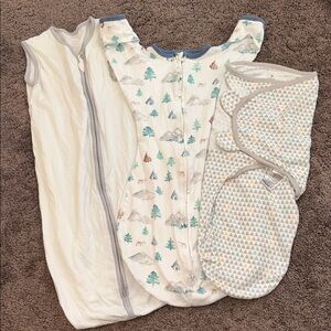 Baby size medium and large sleep sack swaddle & transition sack bundle!!